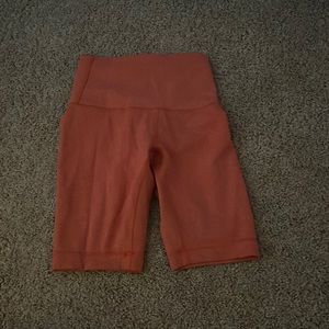 Lululemon Wunder Train High-rise short in size 0 the color is crunch warm coral
